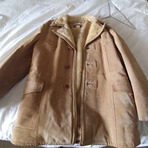 Leather coat by Tip top taylors